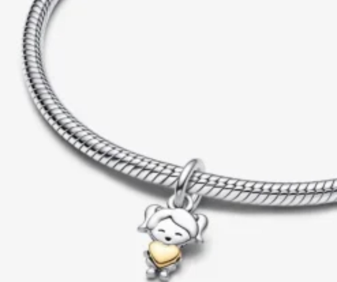 Niña corazón dorado