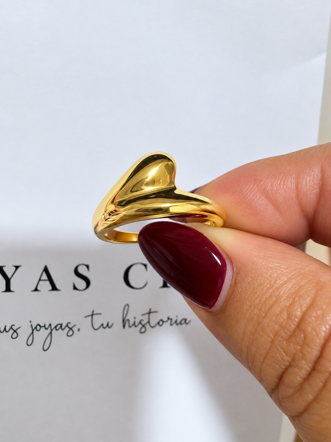 Anillo corazón fluido dorado