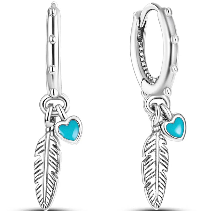 Argollita pluma corazón celeste