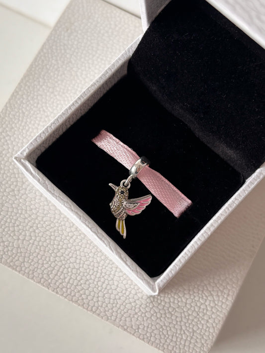 Colibrí amarillo rosa