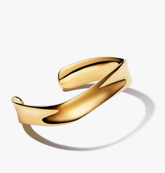 Pulsera dorada rígida ancha