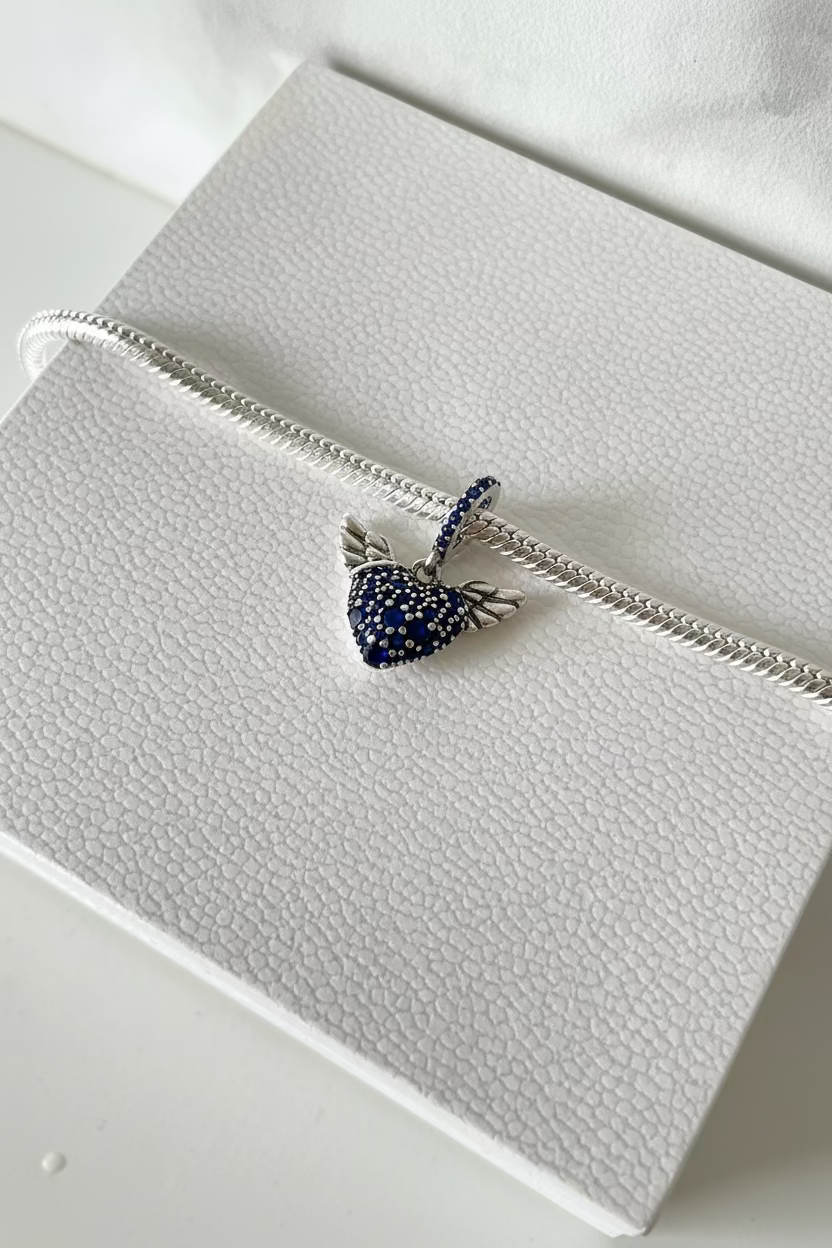 Corazón alado azul