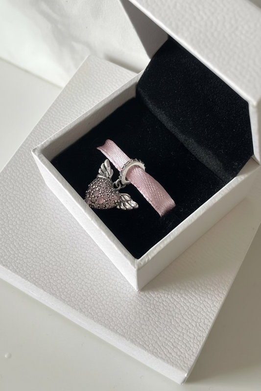 Corazón alado rosado